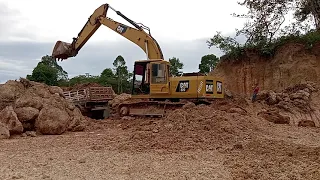 Truck and Excavator working at the mountain TREAK