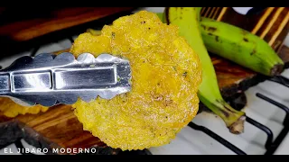 HACIENDO LOS TOSTONES AL AJILLO MAS FAMOSOS DE PUERTO RICO AL ESTILO RESTAURAN CHINO DE BARRIO