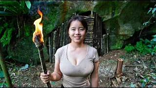 The girl built a safe shelter under a large rock | solo Surviving