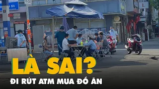 Đi ra ATM rút tiền mua đồ ăn bị phạt 1 triệu, đúng hay sai?