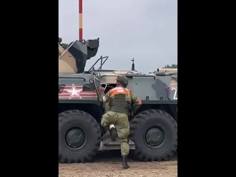 soldiers running to enter moving tanker