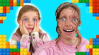 Liza plays LEGO in real life