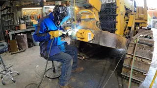 Replacing the mounts on a bulldozer blade
