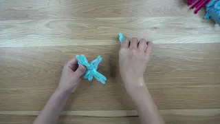 A star flower made from extremely simple light blue chenille wire.