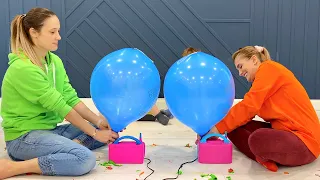 Children And Moms have Fun with Giant Balloon Blow and Pop