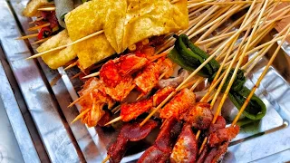 Street food spicy grilled skewers