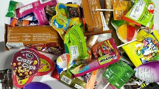 lots of chocolates and candies and surprise egg opening, Asmr