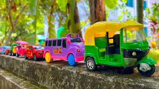 Satisfying Toy CNG Auto Rickshaw, School Bus, Sports Car, Dump Truck Hand Driving On Boundary Wall