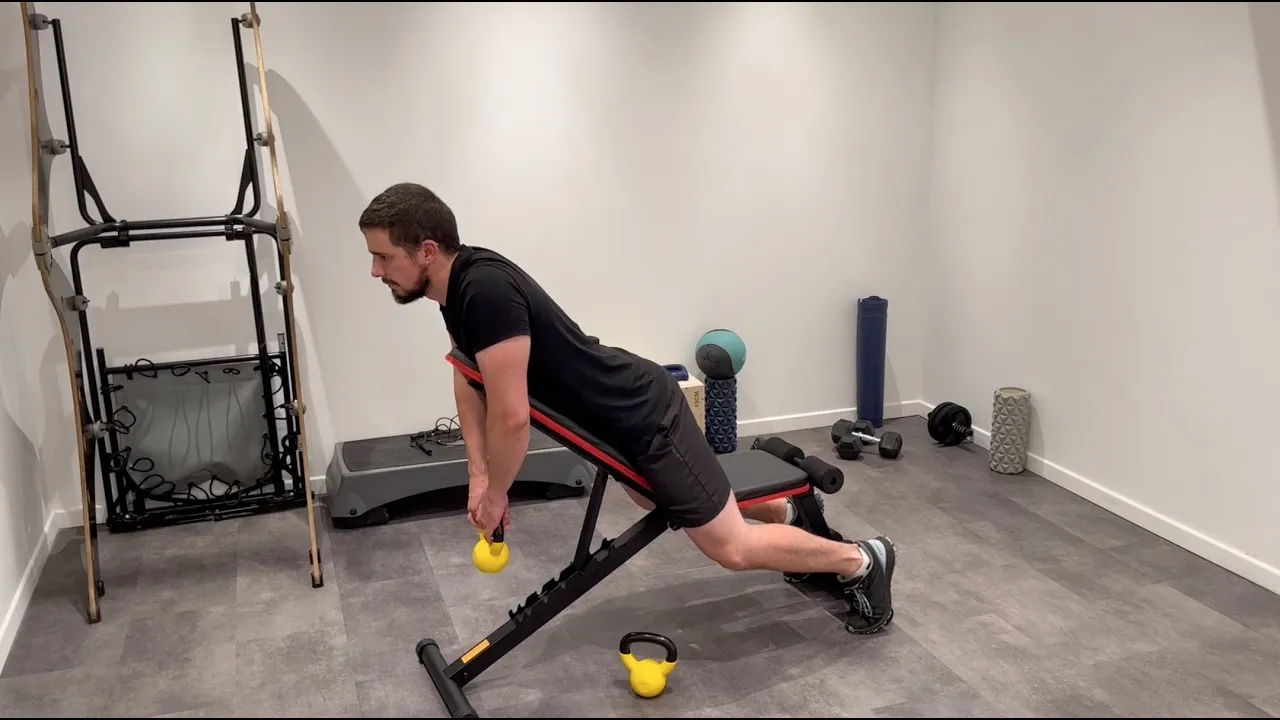 Image Einarmiges Kettlebell Silverback Shrug auf Bank
