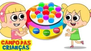 Máquina de dança de bolas surpresa com Elly | Vídeos divertidos de aprendizagem | Campo das Criancas
