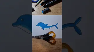 Draw a dolphin with the help of scissors