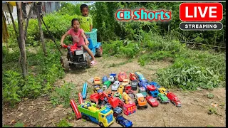 Yana, Oun Mey, today riding a tractor found small cars all over the land