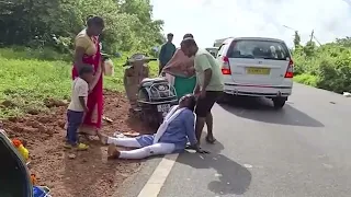 In a miraculous escape, a youth taking his aunt on a motorcycle was hit by a fish carrying truck