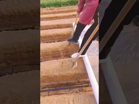 The process of warming the soil when planting plants