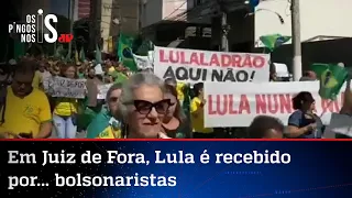 Já eleito pelas pesquisas, Lula é recebido em Juiz de Fora com placas de "ladrão"