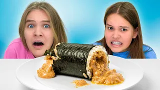 Amelia and Avelina do the Sushi Wheel of Fortune challenge.
