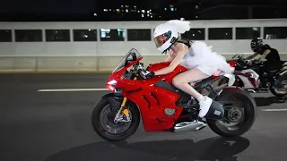 Pretty and cool motorcycle girl