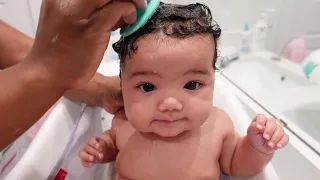 Cute Newborn Baby Getting A Bath!