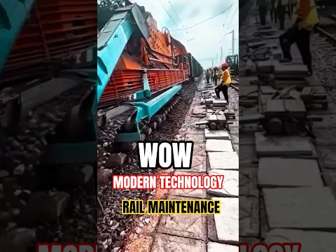 Automatic ballast replacement machine clears and resets rail bed in one continuous pass