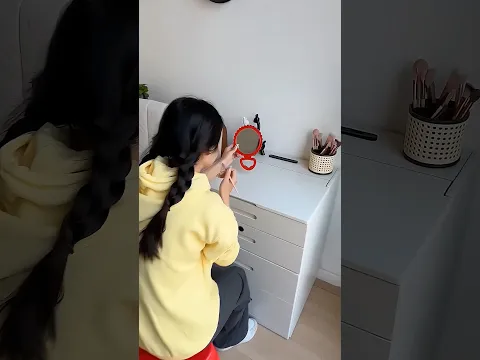 The girl was very happy to see the makeup box.