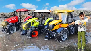 Tractors Case, Claas, JCB Fastrac and excavators stuck in the mud