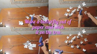 Make a butterfly out of paper and stick it on the tree.