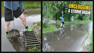 #046-2  Unclogging a storm drain after rain in Germany