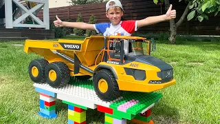 Working together: Trucks and excavator build with Alex