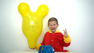 We inflate large magical balloons with animals and pop the balloons.