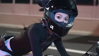 Very cool and beautiful motorcycle girl, motorcycle running towards nature and freedom