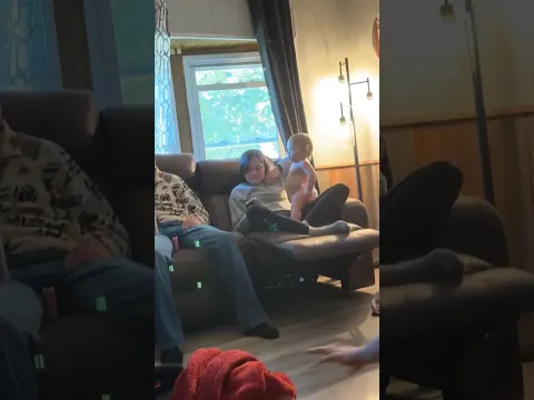 Infant says "mama" for the first time, mom reacts with humor