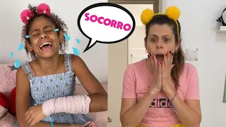 Trollei Maria fingindo braço quebrado