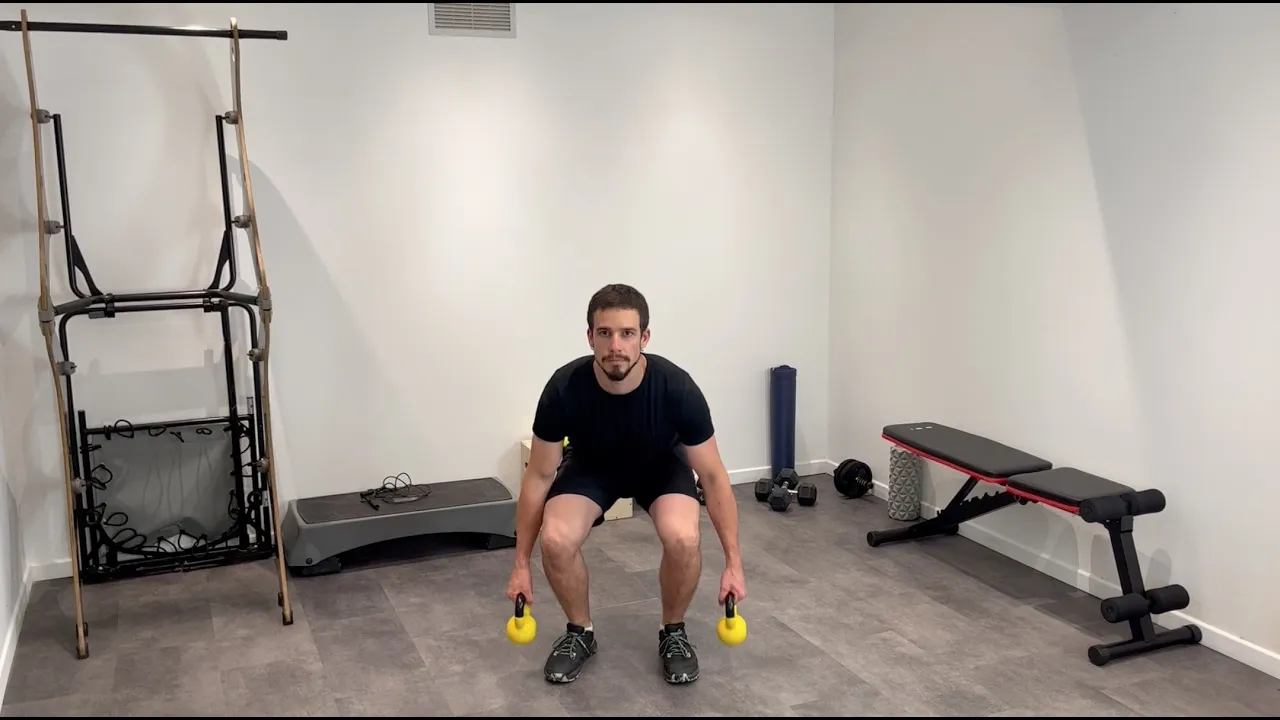 Image Squat sauté avec kettlebell