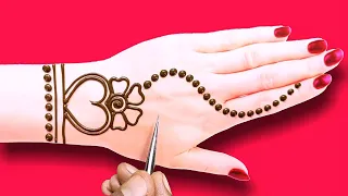simple beautiful Arabic mehndi design - Rakhi,teej special gol tikki mehndi design - back hand henna