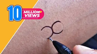 making a beautiful tribal tattoo with help pen cap and pen