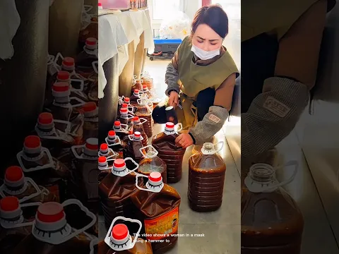 Woman in a mask uses a hammer to close lids on liquid containers