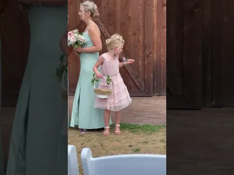 Flower Girl Tries to Shoo Away Annoying Bees at Wedding - 1360422