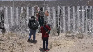 Migrant Family stopped from Hopping Border Wall on Texas - Mexico border