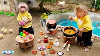 Dad helps baby monkey Annie harvest carrots and cooks her favorite Indian curry