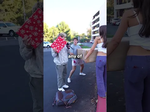 Random College Students put their hand on a Box for a Prize
