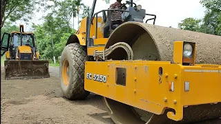 JCB 4x4  and Escort soil compector rolling a road