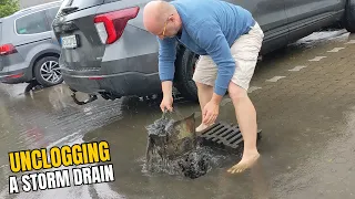 #001 Unclogging a storm drain after heavy rain