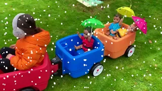 Ride On with dolls and umbrellas