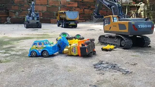 Dump truck dumped damaged car