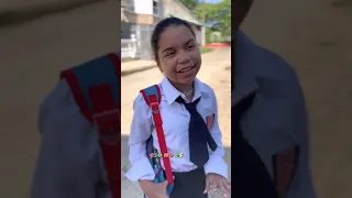 El perro y el gato van para el colegio de Shadia