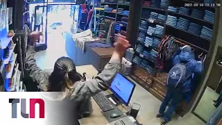 Un delincuente entró a robar a un local y ella hizo una seña que alertó a la Policía: lo detuvieron