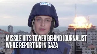 Missile hits tower behind journalist while reporting in Gaza