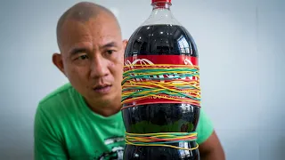Can 1000 rubber bands blow a botter of Coca into air?