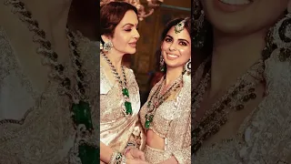 Anant ambani sister isha ambani bridal look and jewellery in radhika merchant pre wedding jamnagar