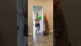 Big and little pets bring balloons to Tanya